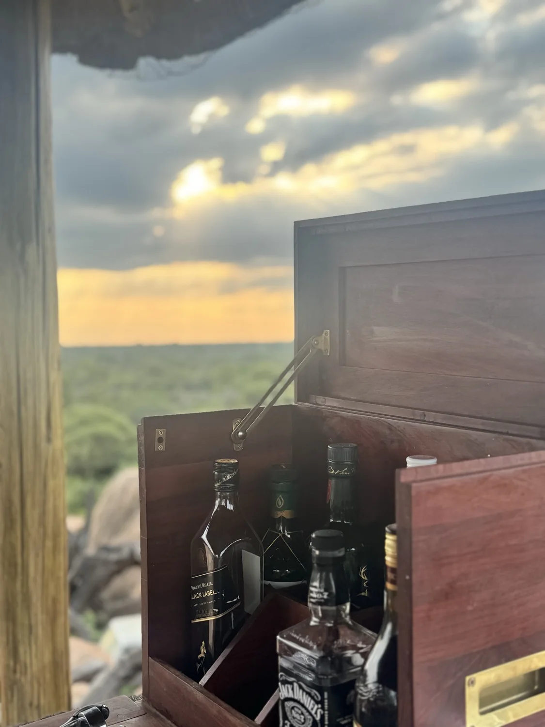 Sundowners at camp, the bushveld stretching to the horizon
