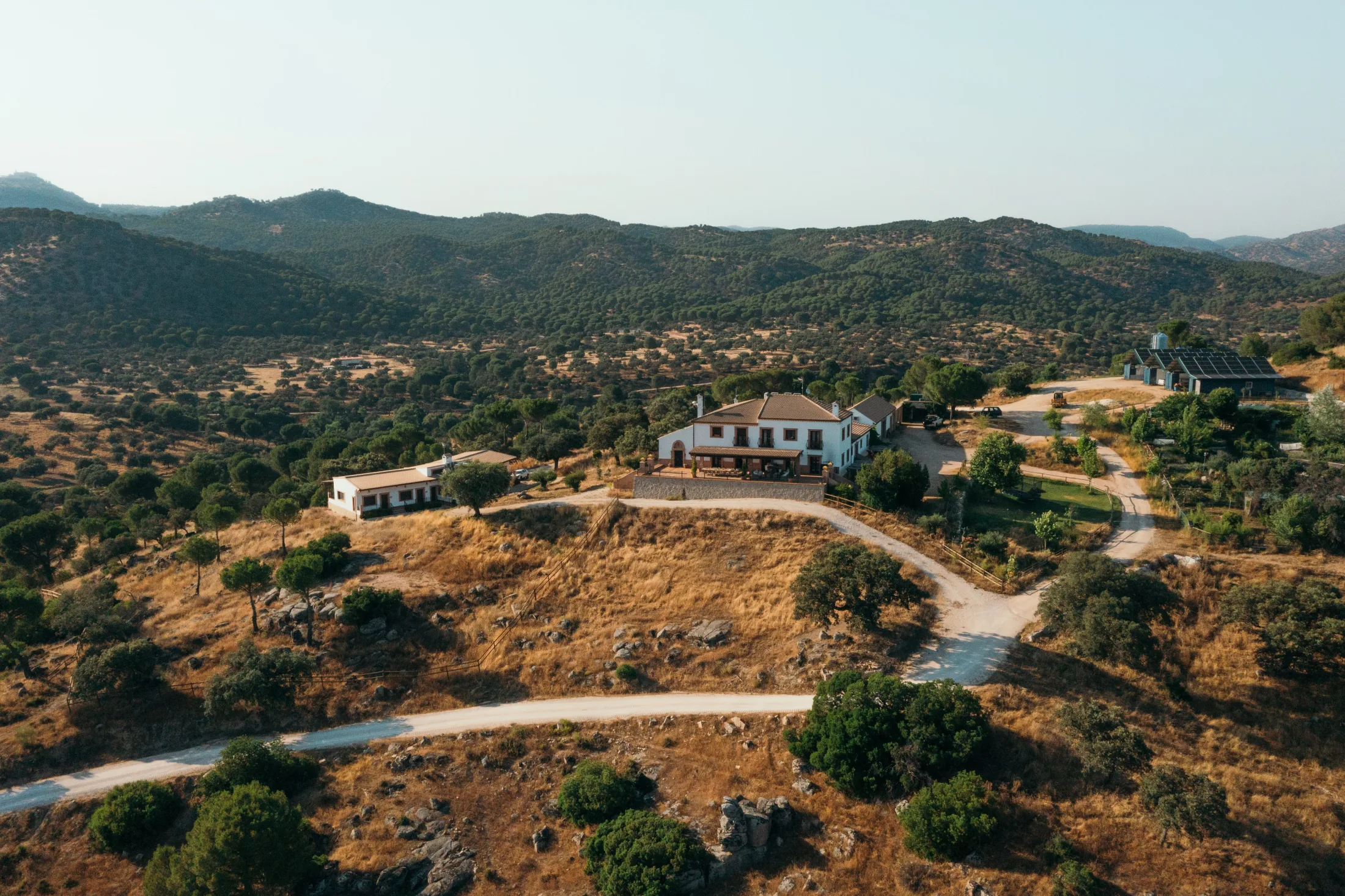 Finca El Encinarejo and its lodge from the air, in the green Sierra de Andújar