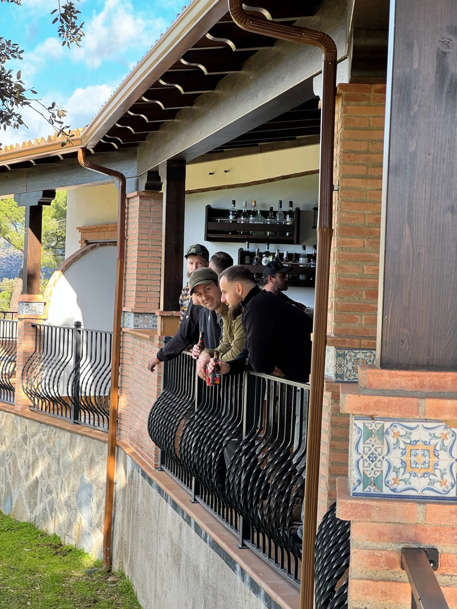 Guests gathered at the terrace bar as evening sets in
