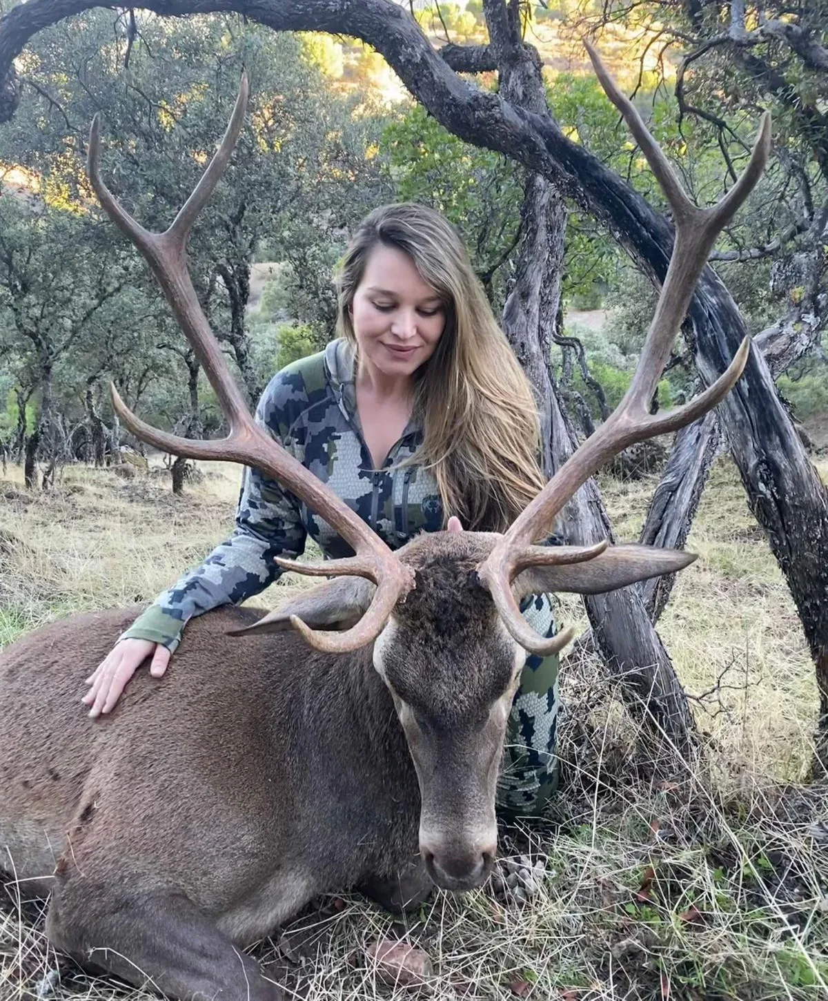 Jessica Hohne, Host — Lodge & Hospitality, with a red stag on the finca