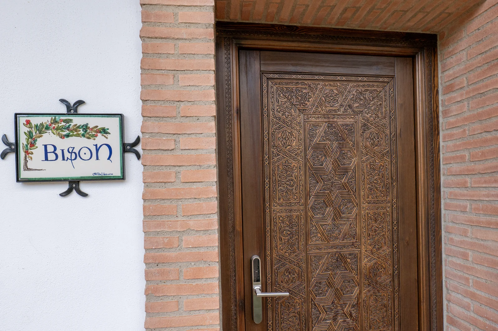 A guest-room door at the finca lodge